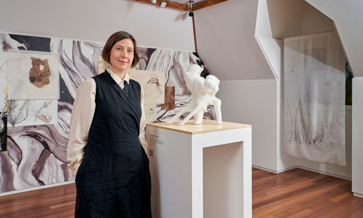 Artist Bridget Currie with some of the works in her exhibition 'each one a world' at Carrick Hill. Photo: Sam Roberts / supplied