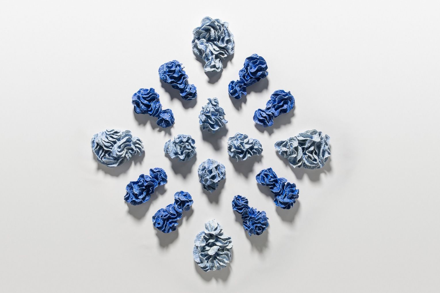 Sam Gold, 'The marrow in the tide, slowly spills into the mouth of love', 2024, porcelain and glaze. Photo: Connor Patterson, courtesy the artist and Hugo Michell Gallery