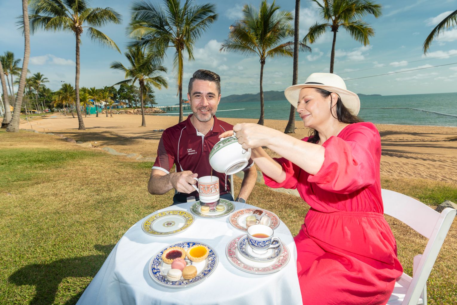 Tea for two: Councillor Liam Mooney and Townsville City Galleries director Holly Arden enjoy a cup of tea on The Strand to celebrate the Wedgwood: Artists and Industry exhibition coming to Townsville.