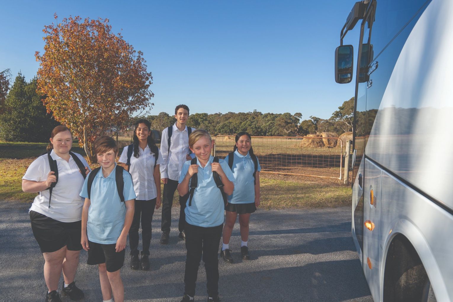 Students learn strategies for safe road crossing, seatbelt and headphone use, respectful passenger behaviour, and the importance of staying alert at the bus stop.