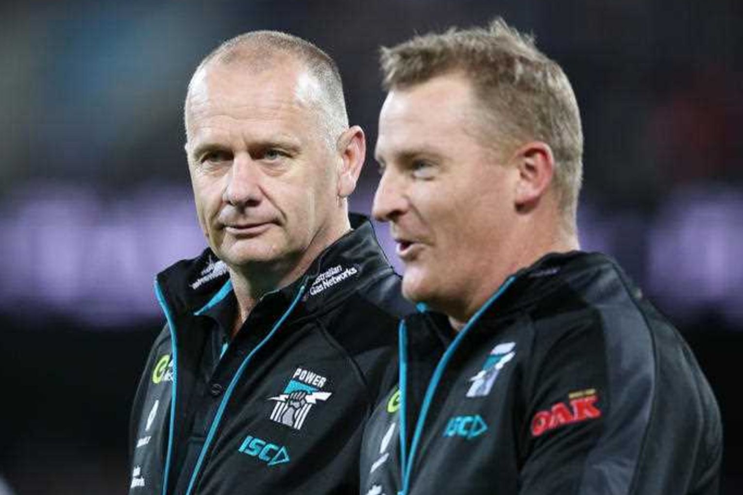 Port coaches past and present will go head-to-head in a crucial clash at Adelaide Oval. Photo: Ben Macmahon/AAP 