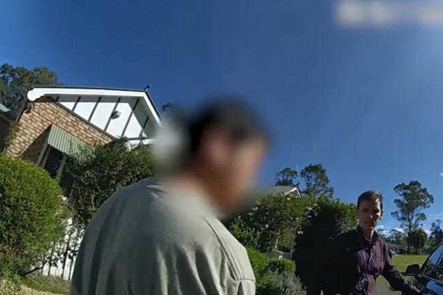 A man (left) has been charged with assaulting and torturing a seven-week-old baby boy. Photo: Queensland Police Service/AAP