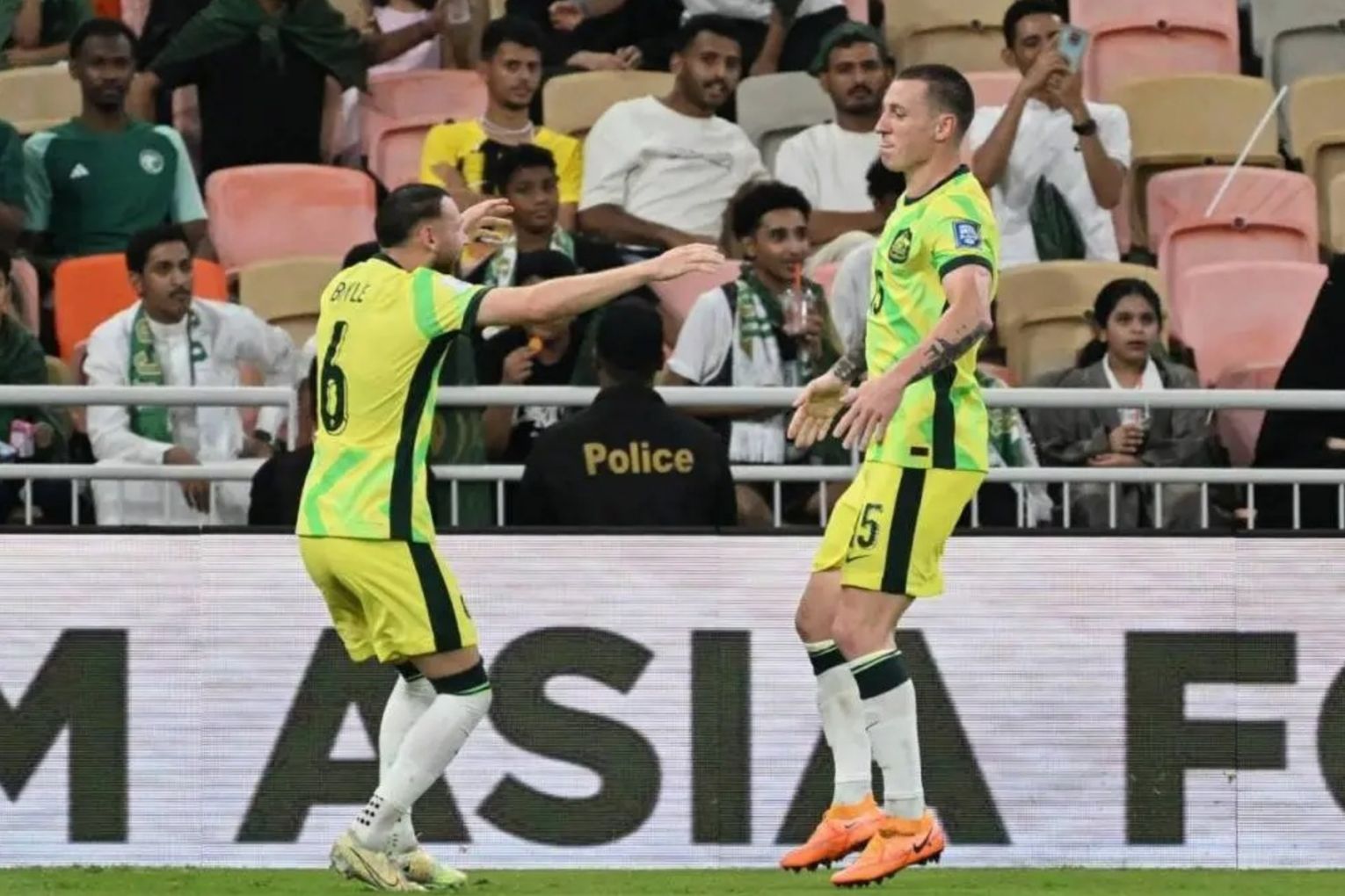 Australia booked direct qualification to next year's World Cup in north America.